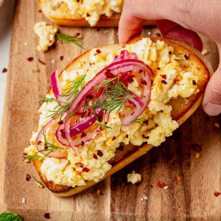 baked feta eggs on sourdough toast.
