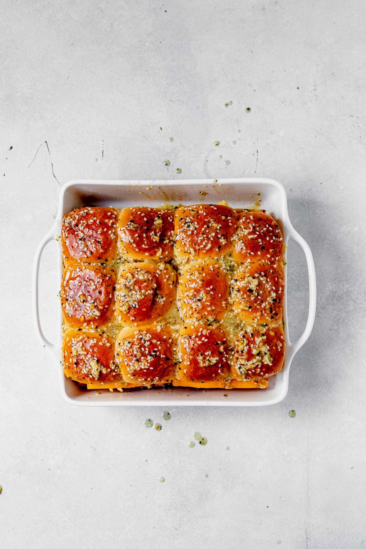 baked breakfast slides in a square baking dish on a counter