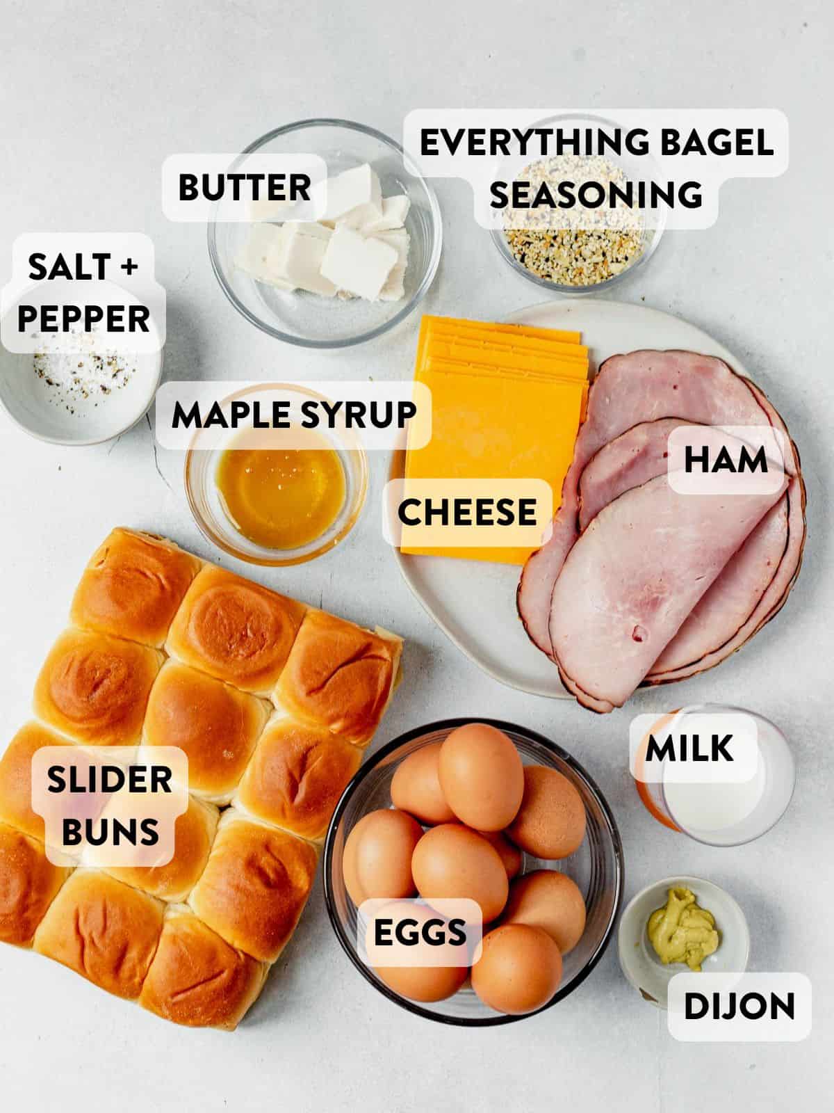 ingredients for breakfast sliders laid out on a counter and labeled