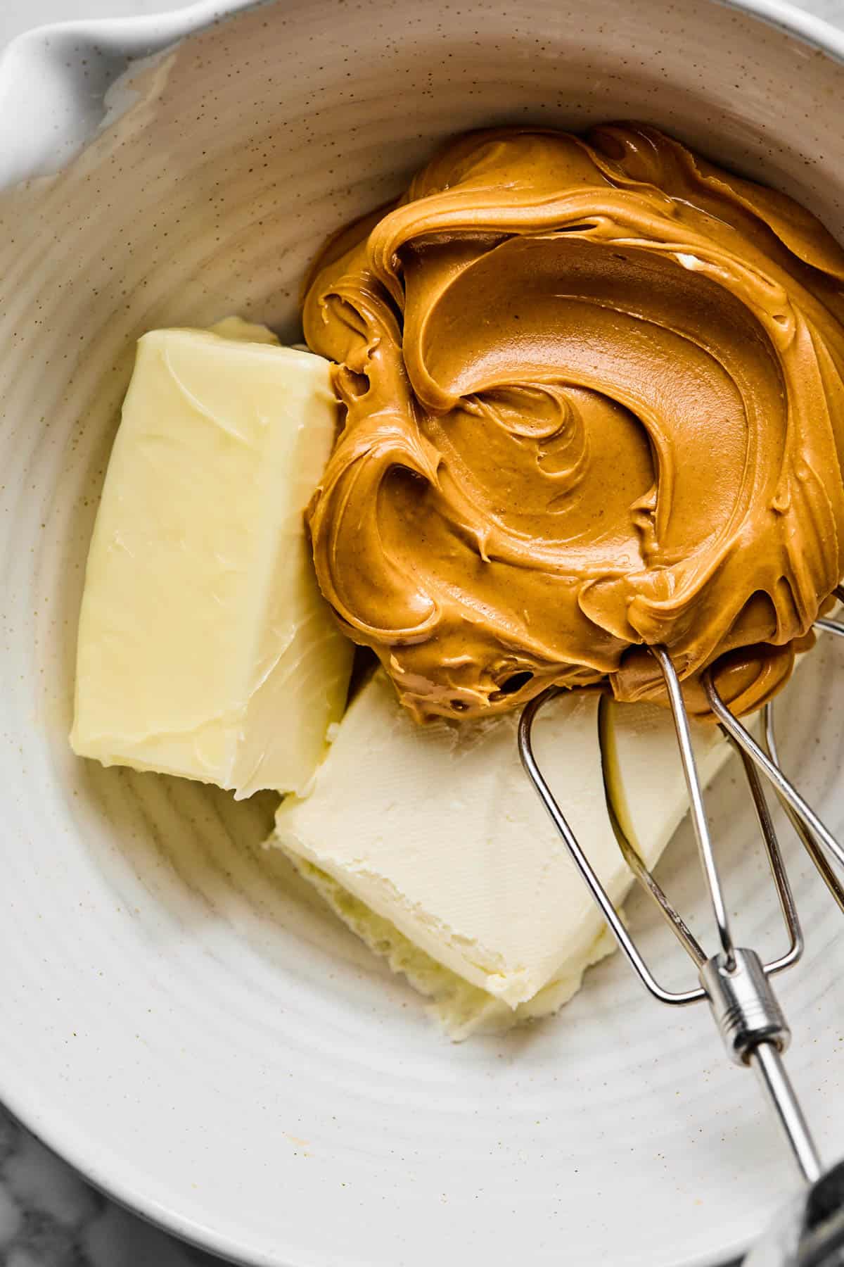ingredients for buckeye dip in mixer ready to be creamed with beater