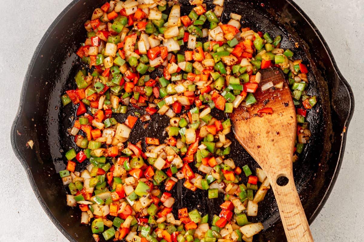 sauteed onion and pepper in cajun seasoning