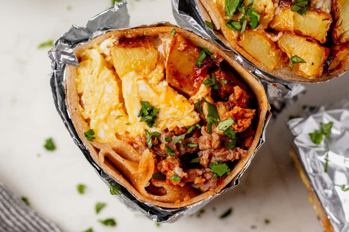 chorizo breakfast burrito cut in half
