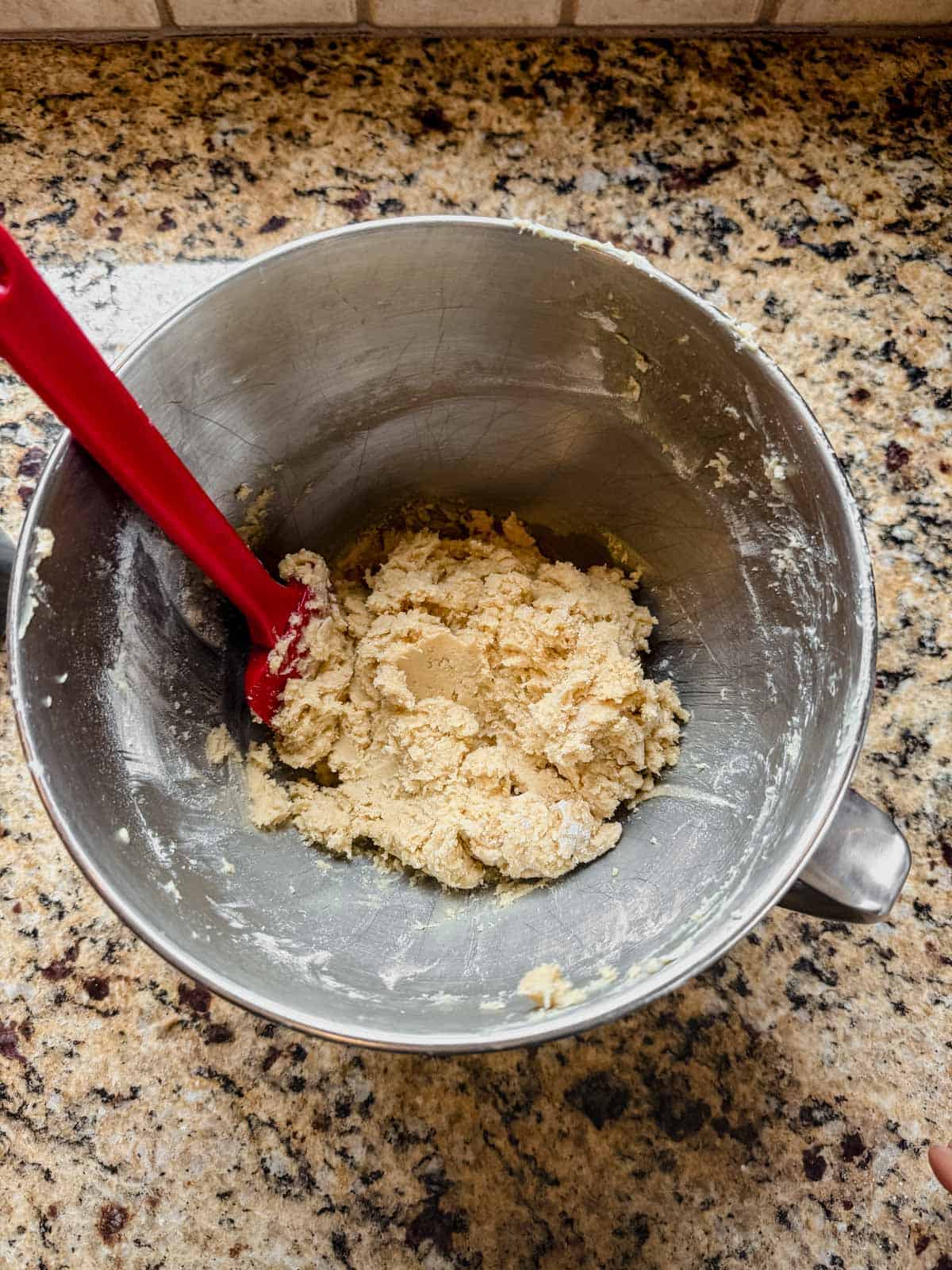 christmas kitchen sink cookie dough mixed in a mixing bowl.
