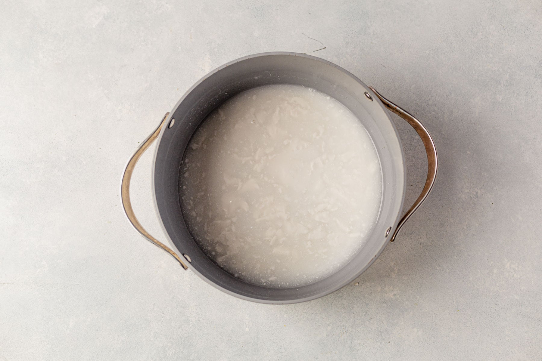 coconut milk, water and salt in a stock pot