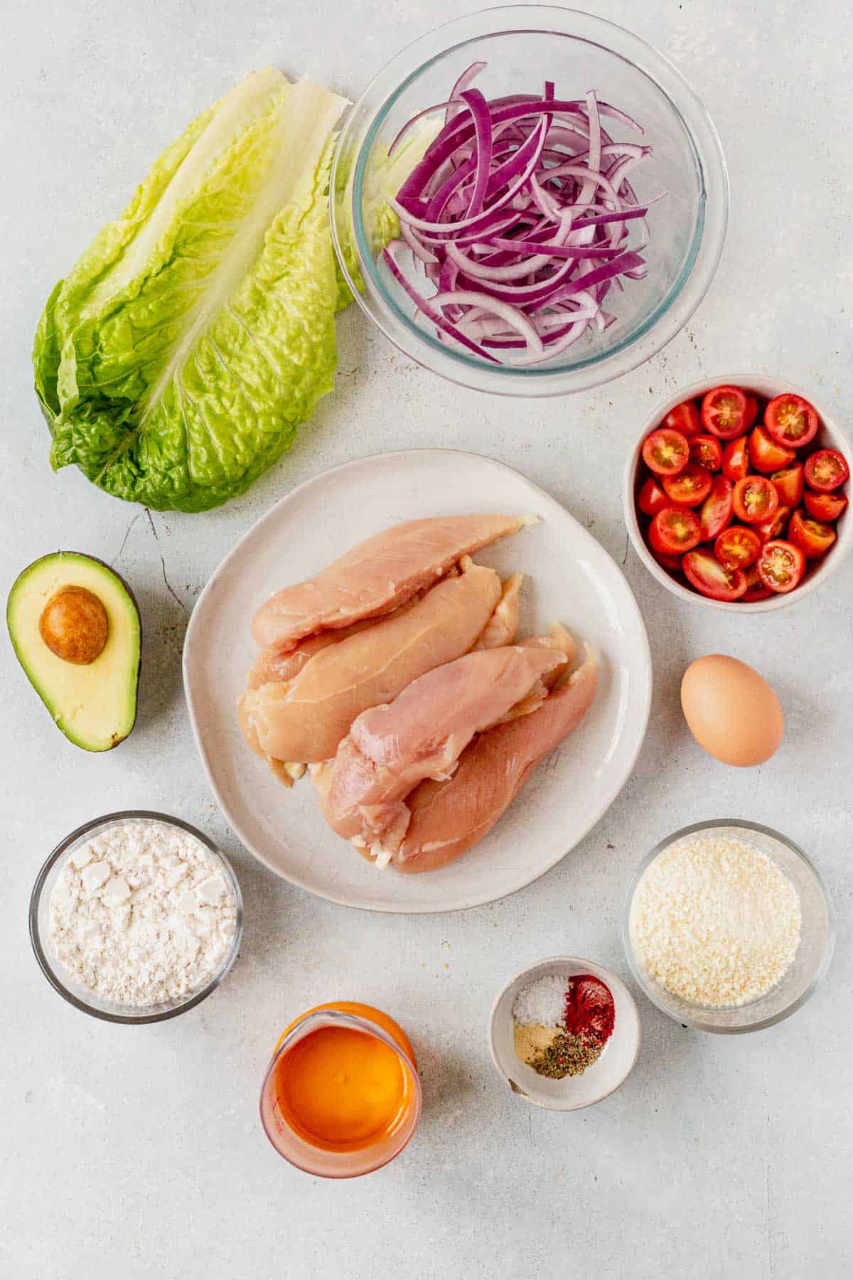 crispy chicken salad ingredients on a countertop