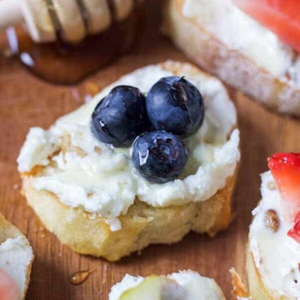 Goat Cheese, Fruit, Walnut and Honey Crostini