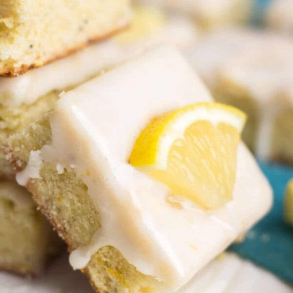 lemon poppyseed bread standing up against other slices