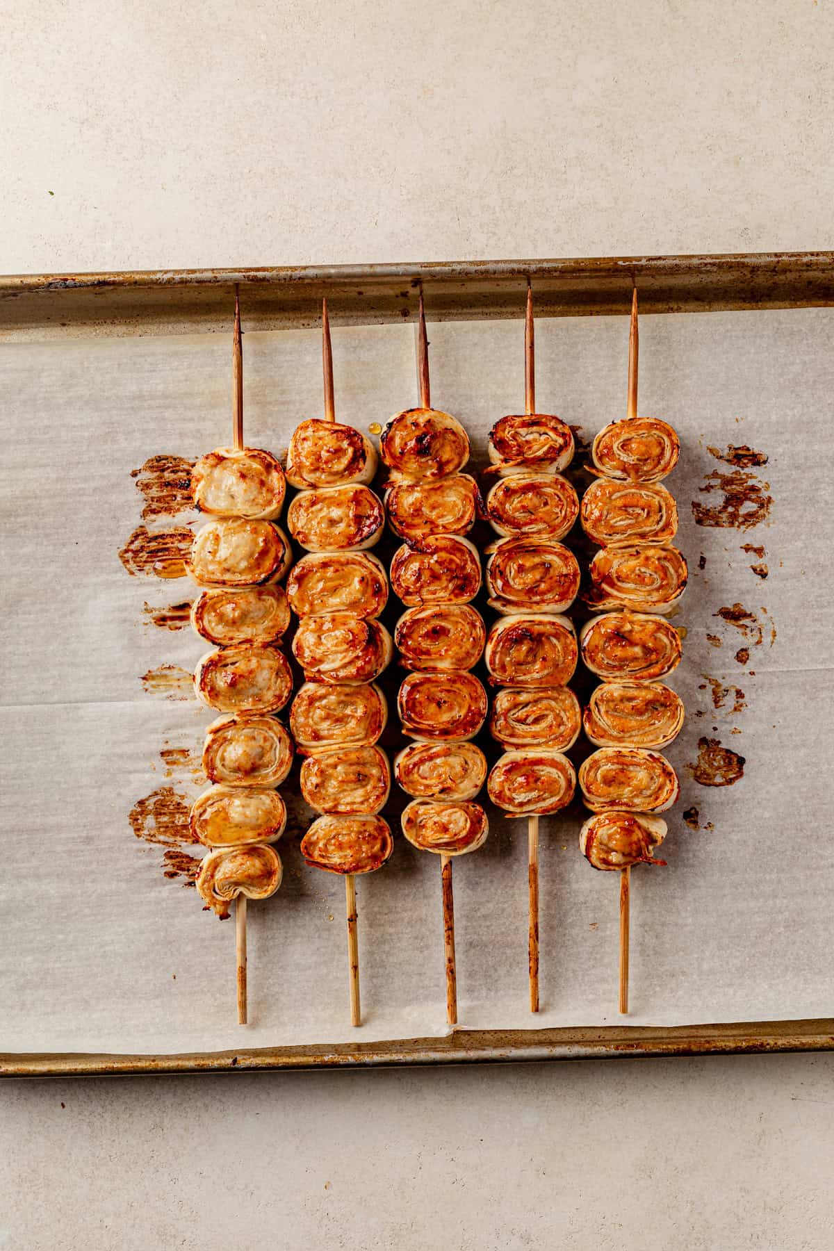 baked lazy kebab rolls on a sheet pan.