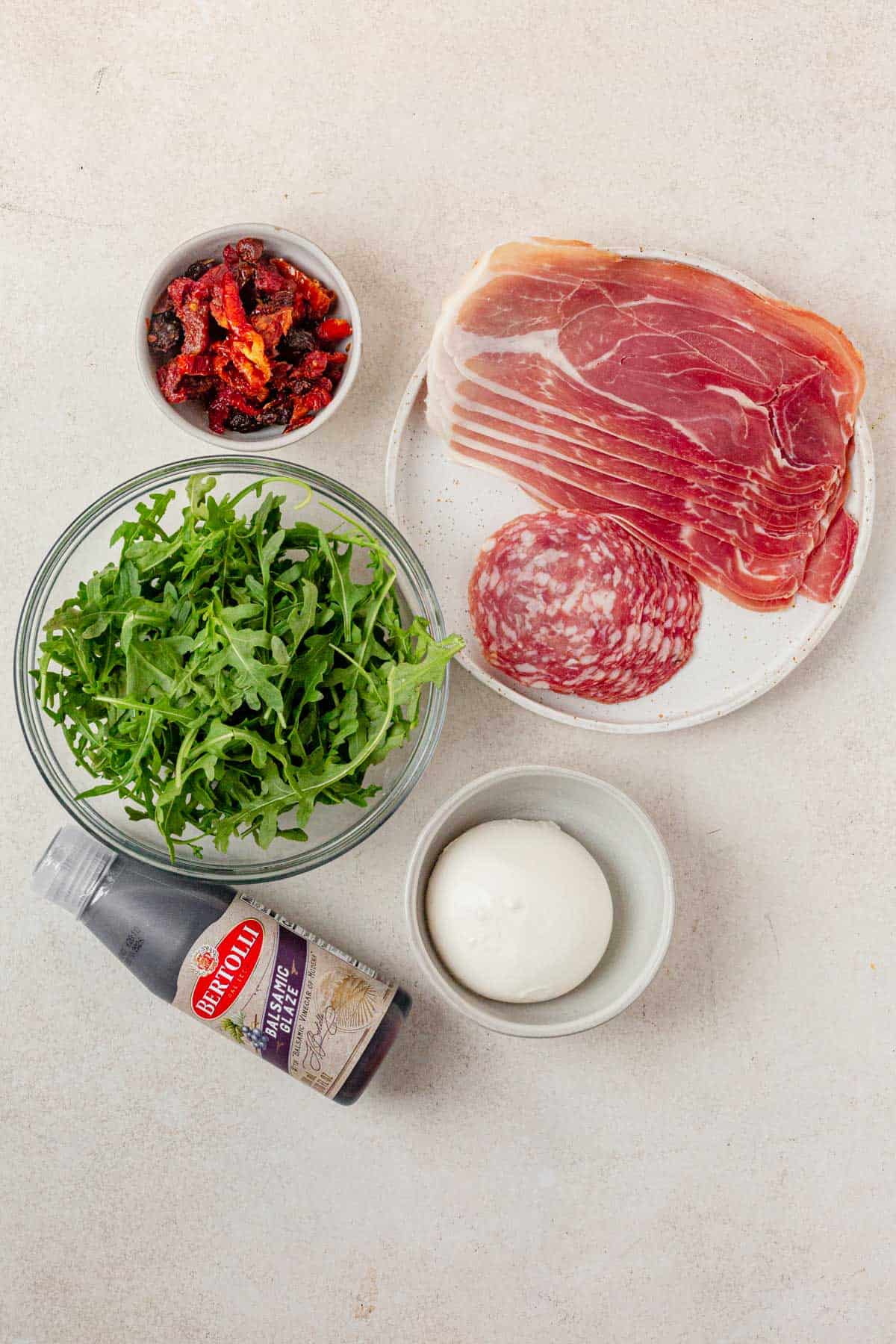 ingredients for italian sushi on a counter.