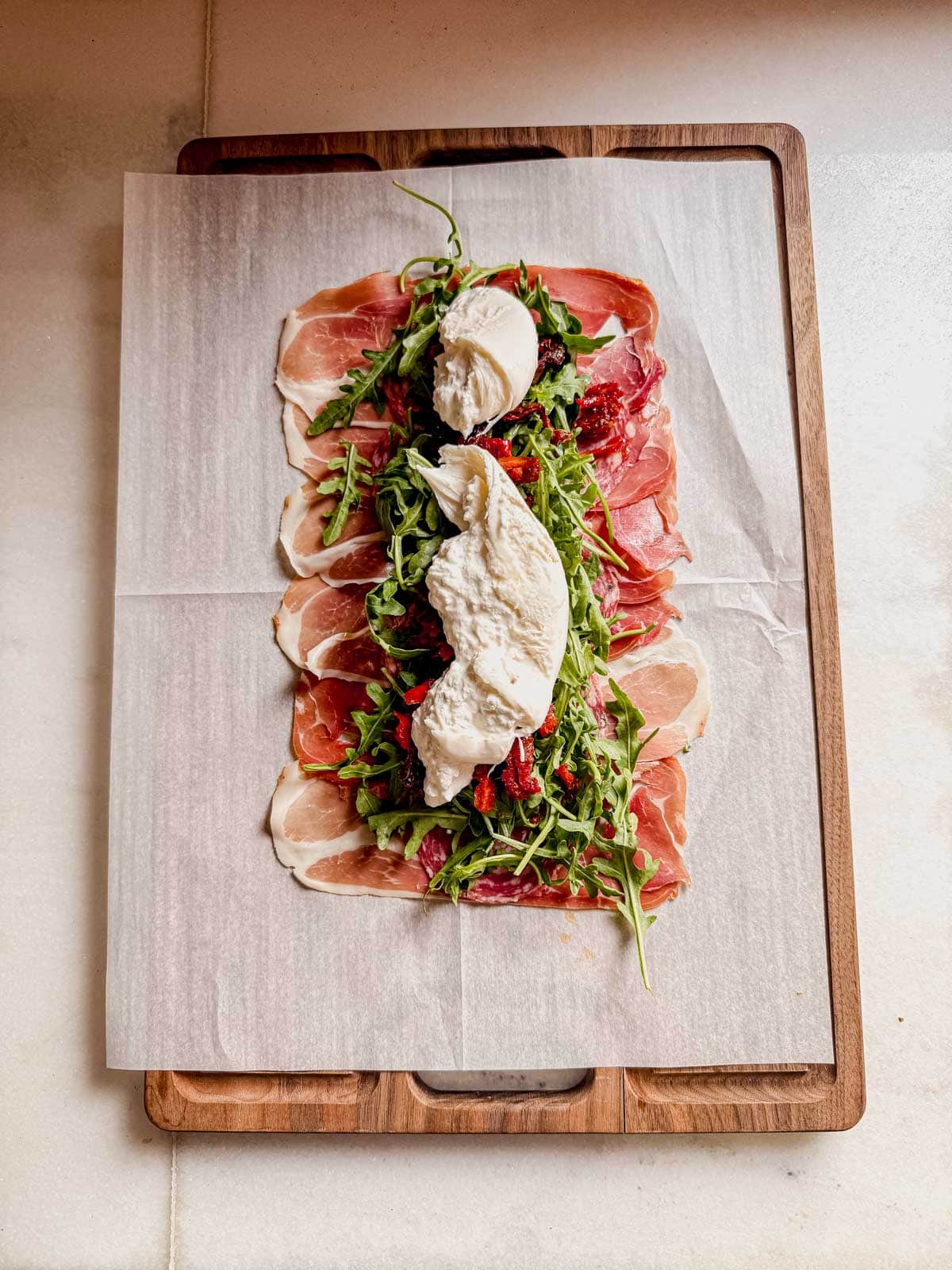 italian sushi filling on top of proscuitto.