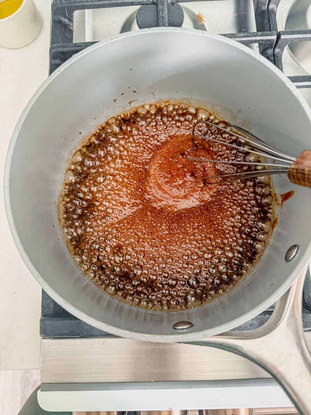 korean bbq sauce simmering on the stove.