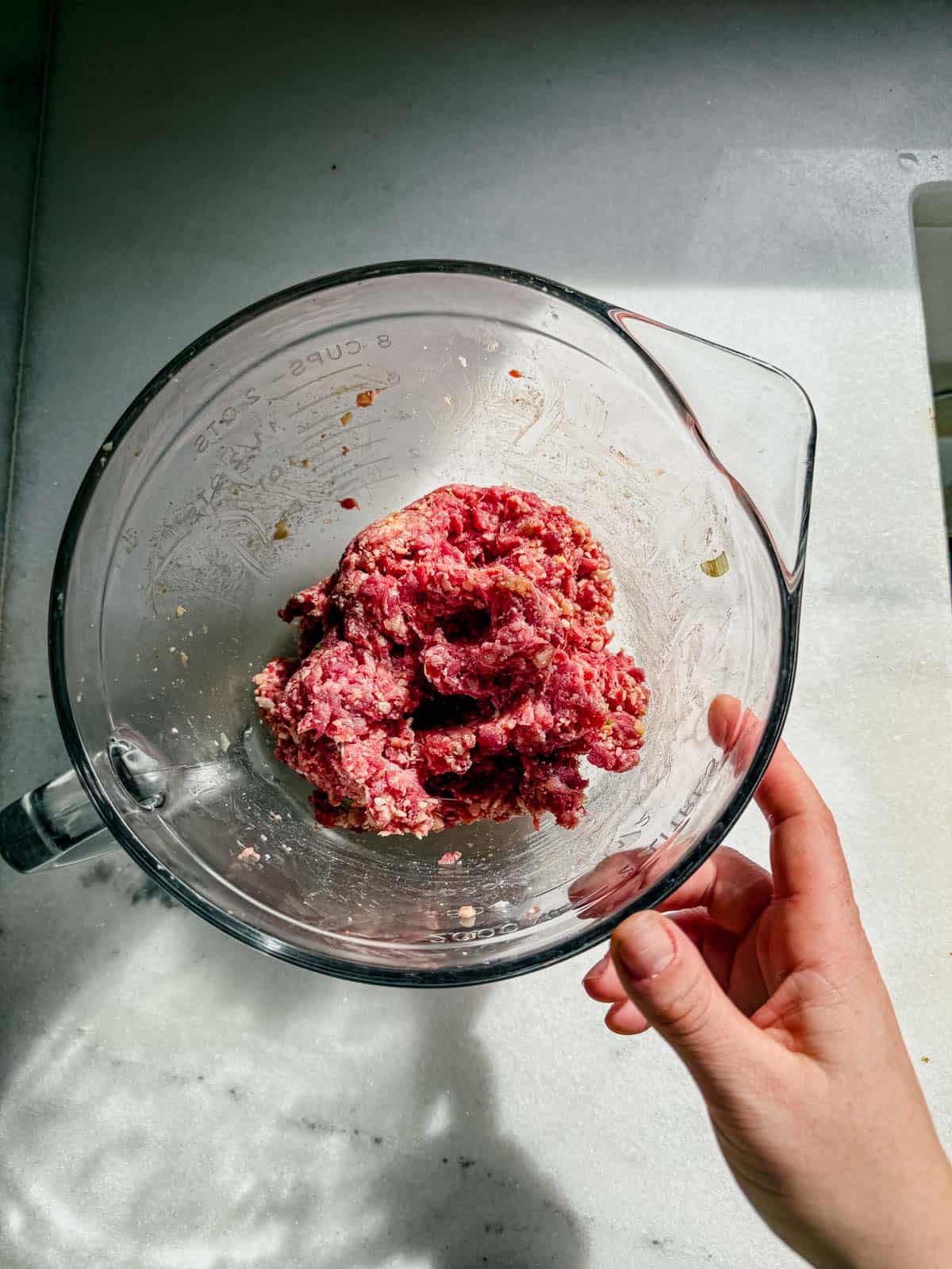 korean meatball mixture in a mixing bowl.