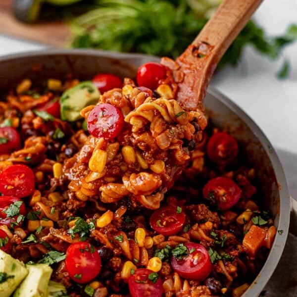 a serving spoon full of taco pasta