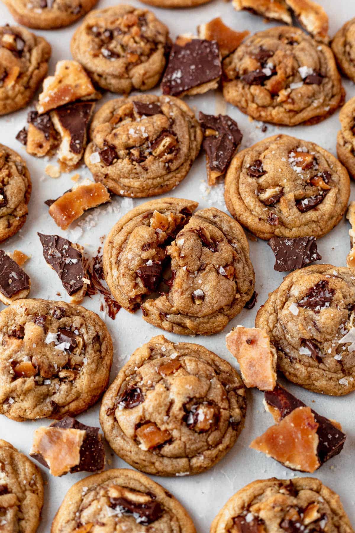 toffee cookies cooling on parchment paper