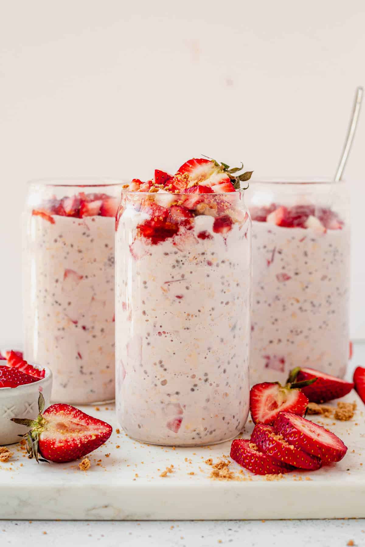 3 glasses of strawberry cheesecake overnight oats
