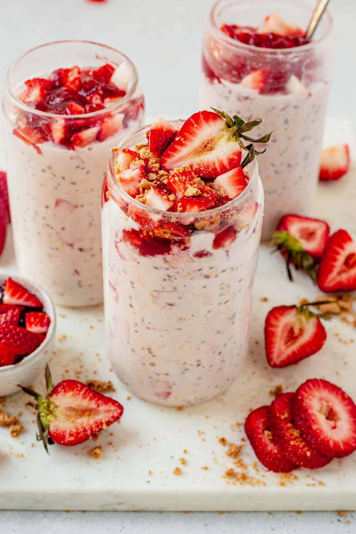 three jars of strawberry cheesecake overnight oats