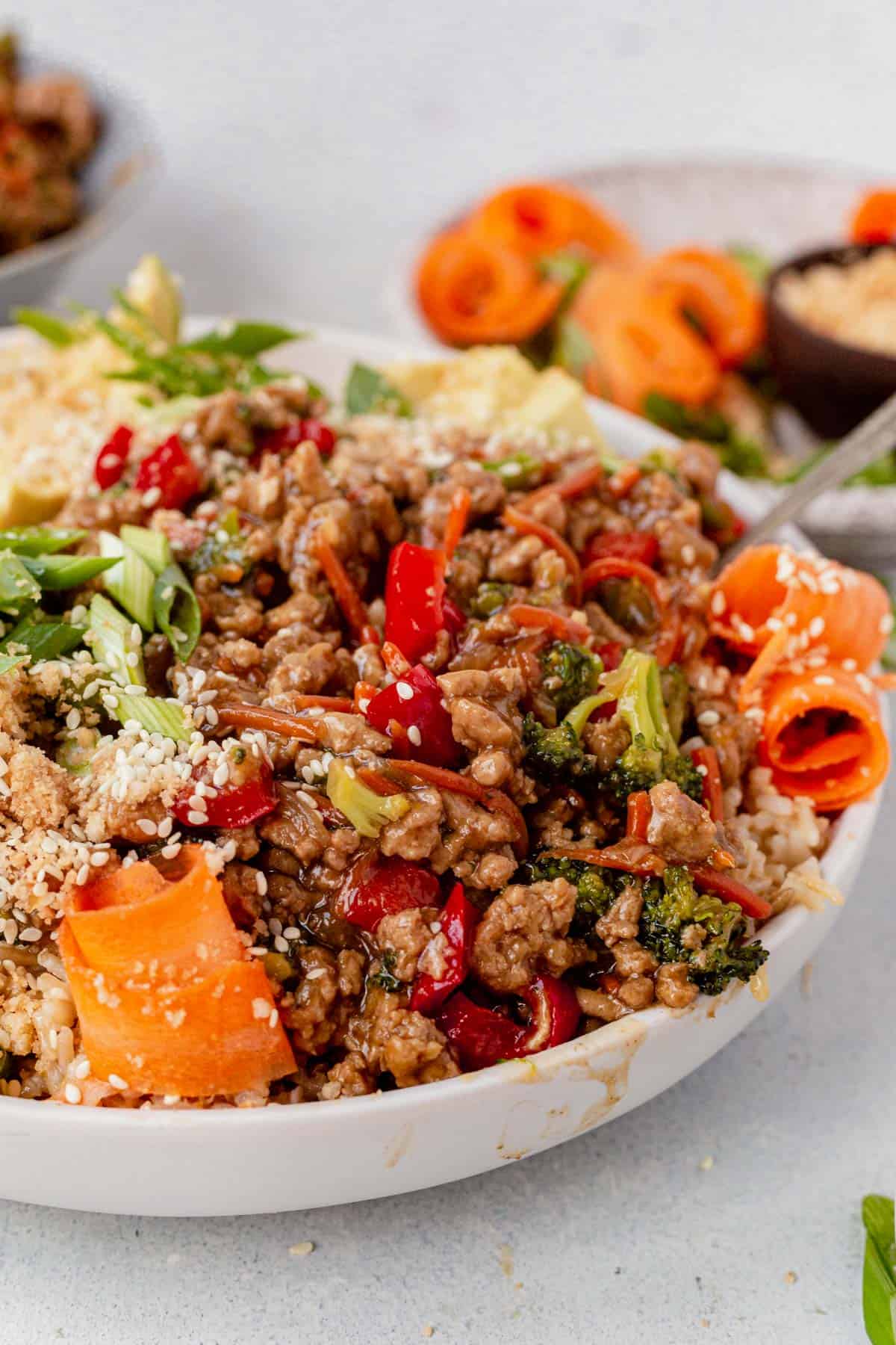 ground turkey teriyaki and vegetables on top of rice