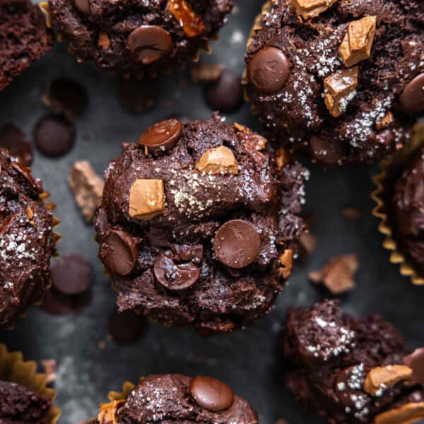 triple chocolate muffins on a countertop.